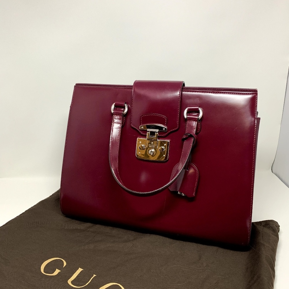 Wine colored Gucci top handle bag